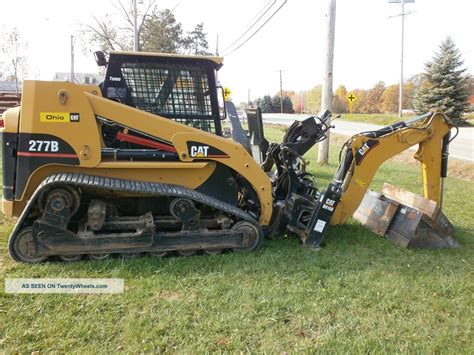 cat skid steer backhoe|cat skid steer grader attachment.